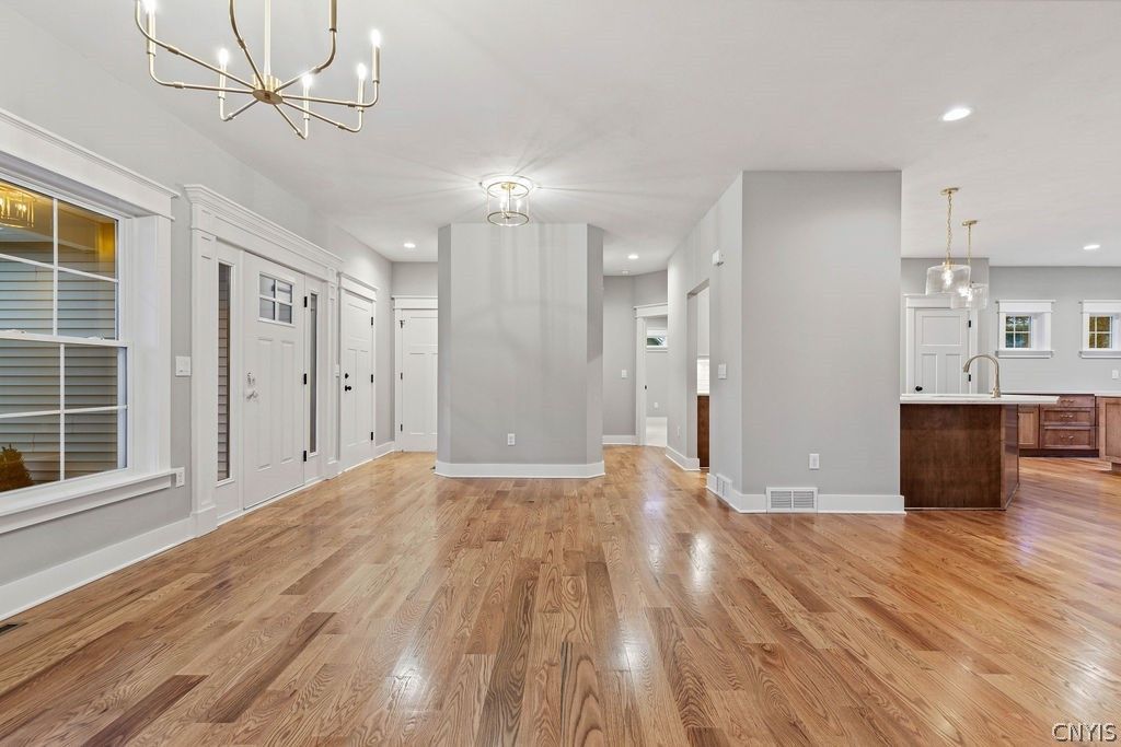 Chandelier, Empty room, Interior, Kitchen, Pendant Lights, Recessed Lighting, Wood Texture Flooring