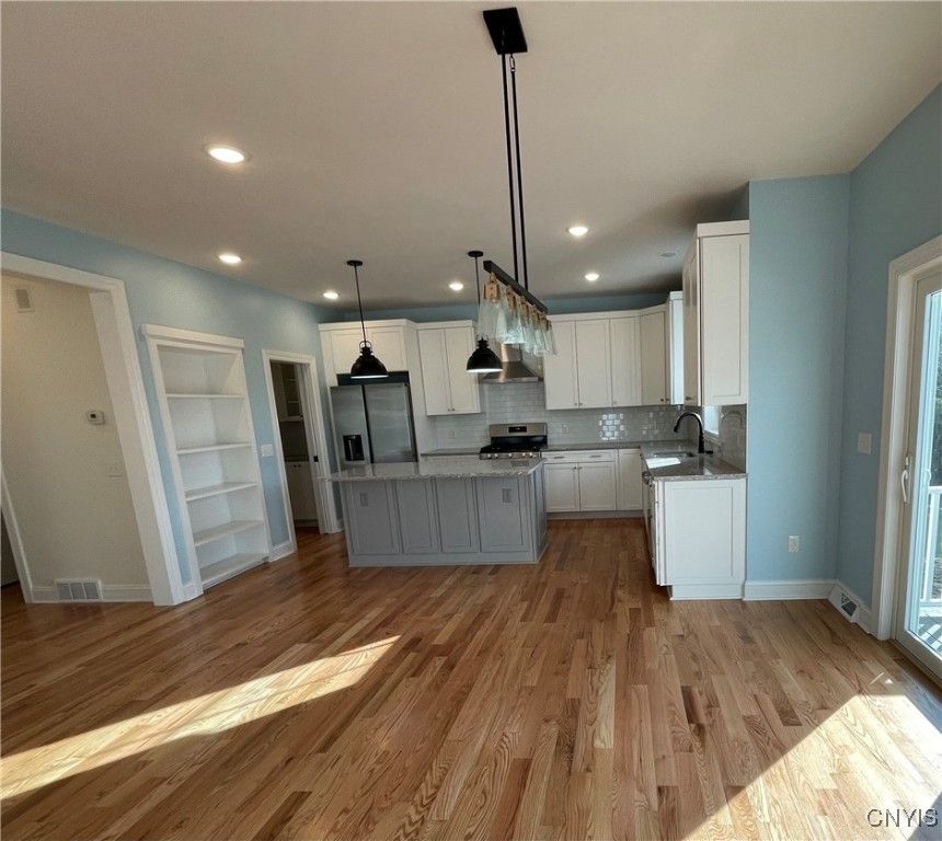 Interior, Kitchen, Pendant Lights, Recessed Lighting, Stainless Steel Appliances, Wood Texture Flooring