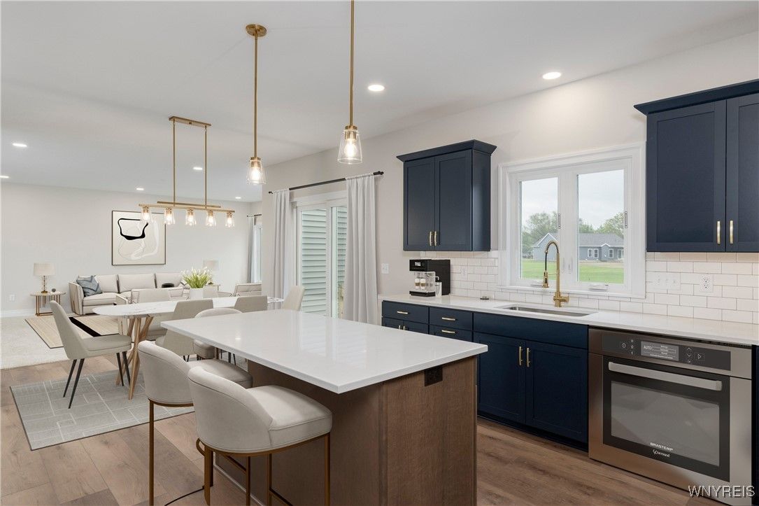 Dining room, Interior, Kitchen, Living room, Pendant Lights, Recessed Lighting, Stainless Steel Appliances, Wood Texture Flooring