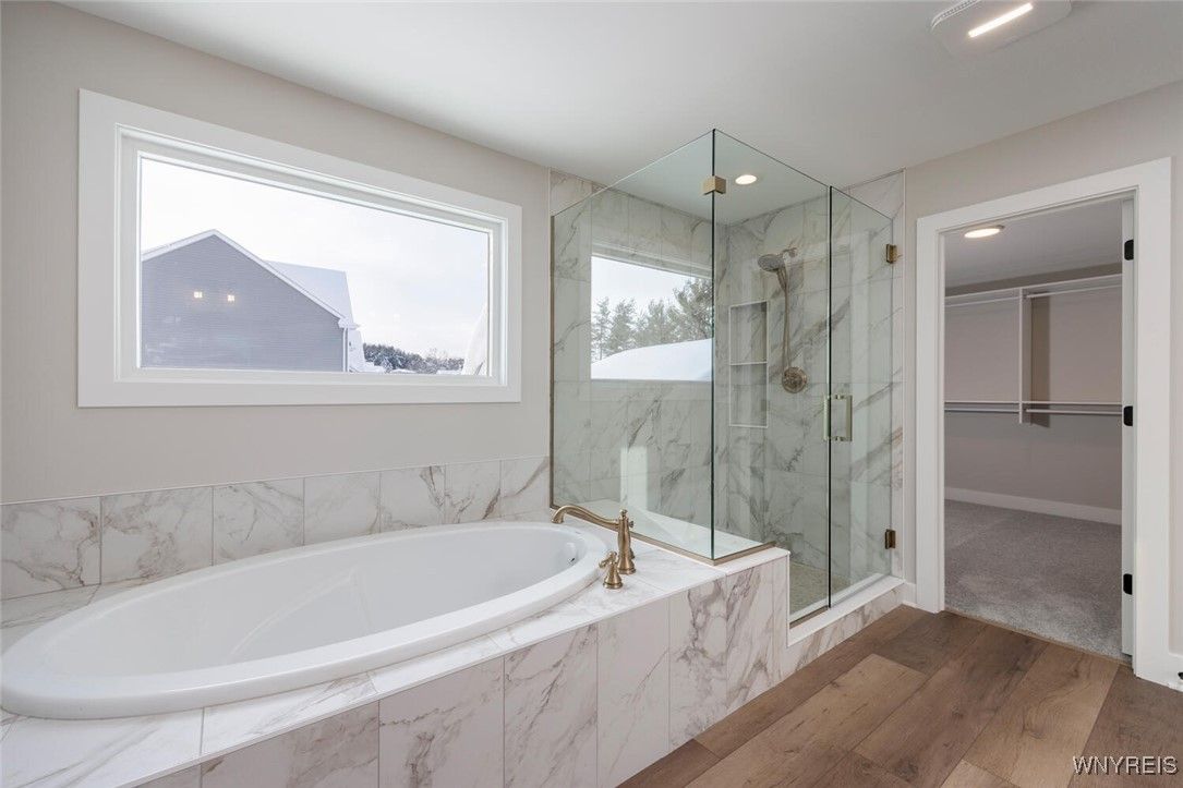 Bathroom, Glass Shower, Interior, Marble Walls, Recessed Lighting, Wood Texture Flooring