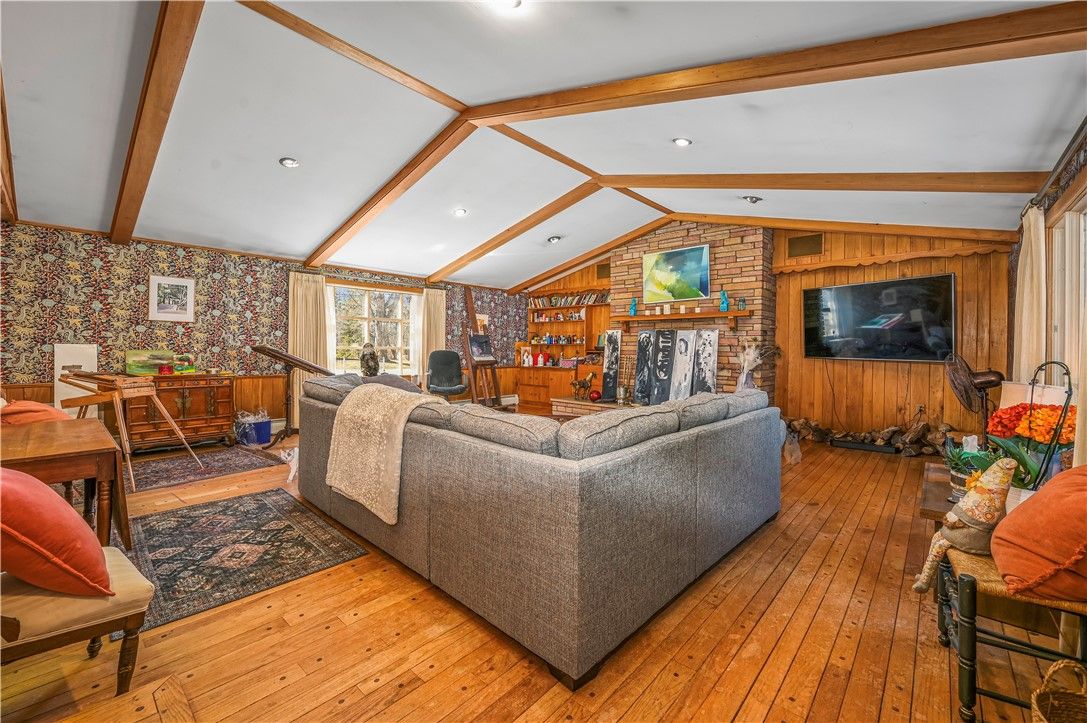 Fireplace, Interior, Living room, Recessed Lighting, Stone Walls, Wooden Beams, Wood Texture Flooring