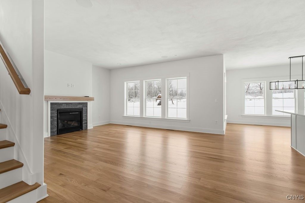 Empty room, Fireplace, Interior, Pendant Lights, Recessed Lighting, Wood Texture Flooring