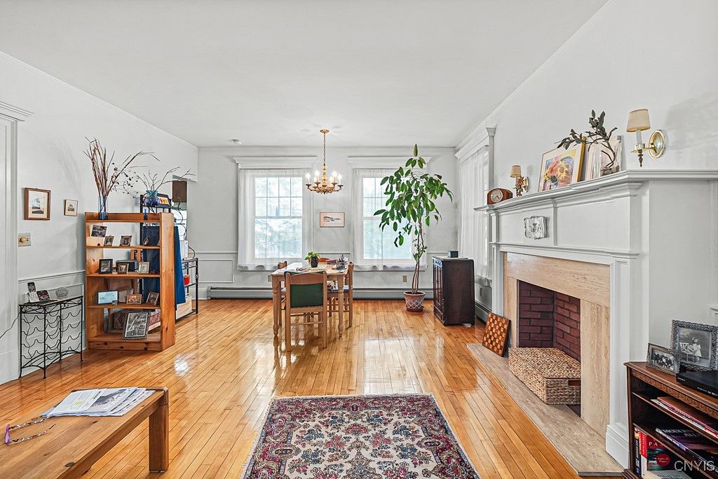 Chandelier, Dining room, Fireplace, Interior, Wood Texture Flooring