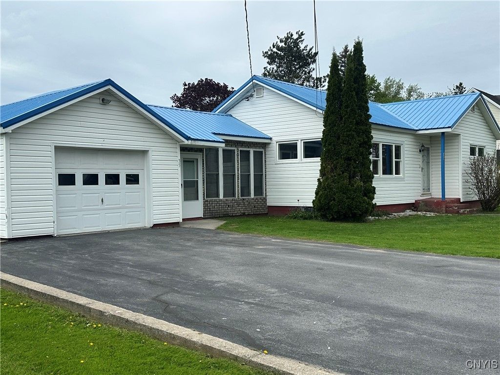 Attached, Exterior, Facade, Solar Panels, Ranch