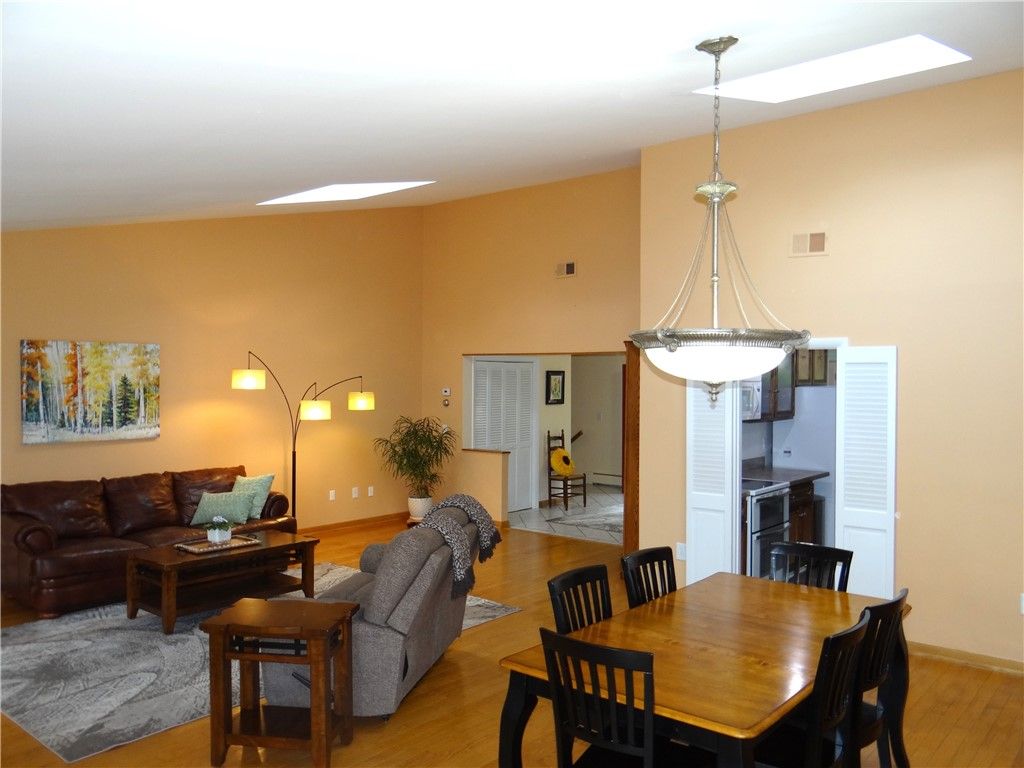 Dining room, Interior, Living room, Pendant Lights, Wood Texture Flooring