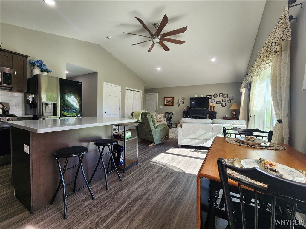 Dining room, Interior, Kitchen, Living room, Recessed Lighting, Stainless Steel Appliances, Wood Texture Flooring