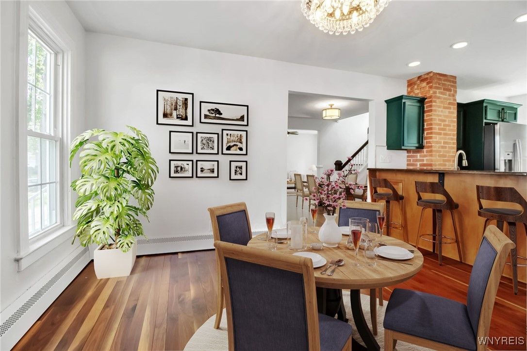Dining room, Fireplace, Interior, Recessed Lighting, Stone Walls, Wood Texture Flooring