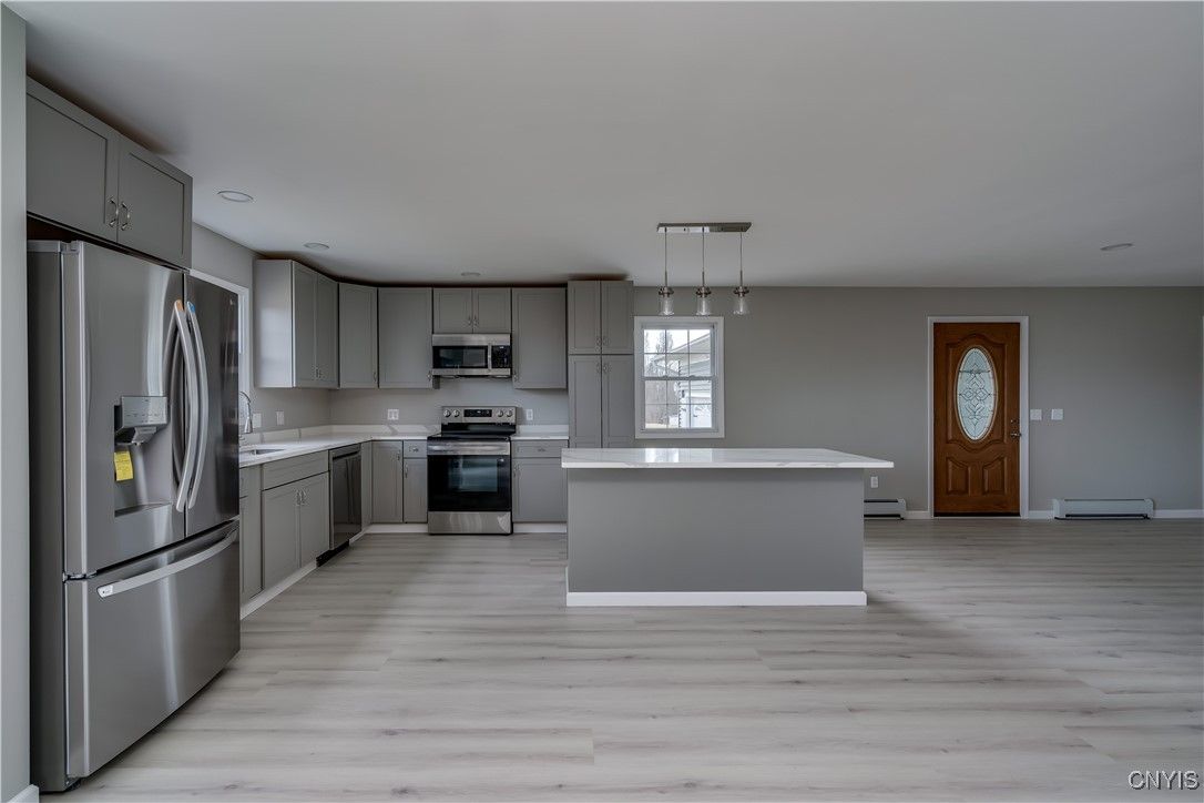 Interior, Kitchen, Pendant Lights, Recessed Lighting, Stainless Steel Appliances, Wood Texture Flooring