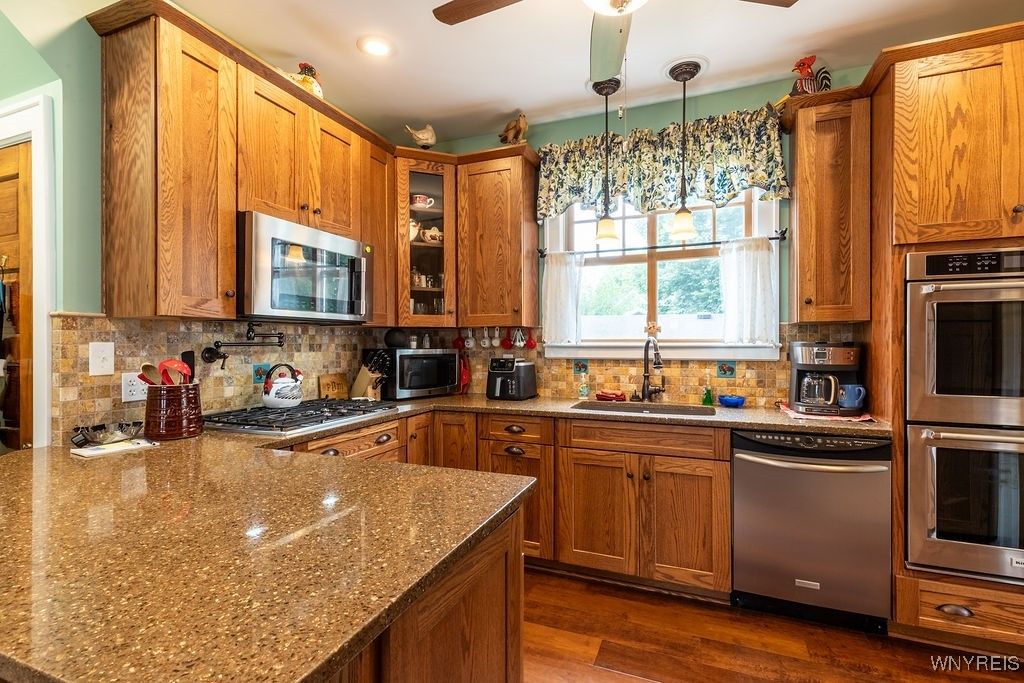 Chandelier, Interior, Kitchen, Recessed Lighting, Stainless Steel Appliances, Wood Texture Flooring