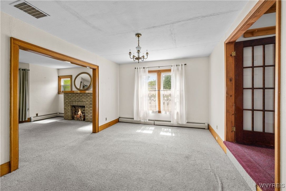 Chandelier, Empty room, Fireplace, Interior