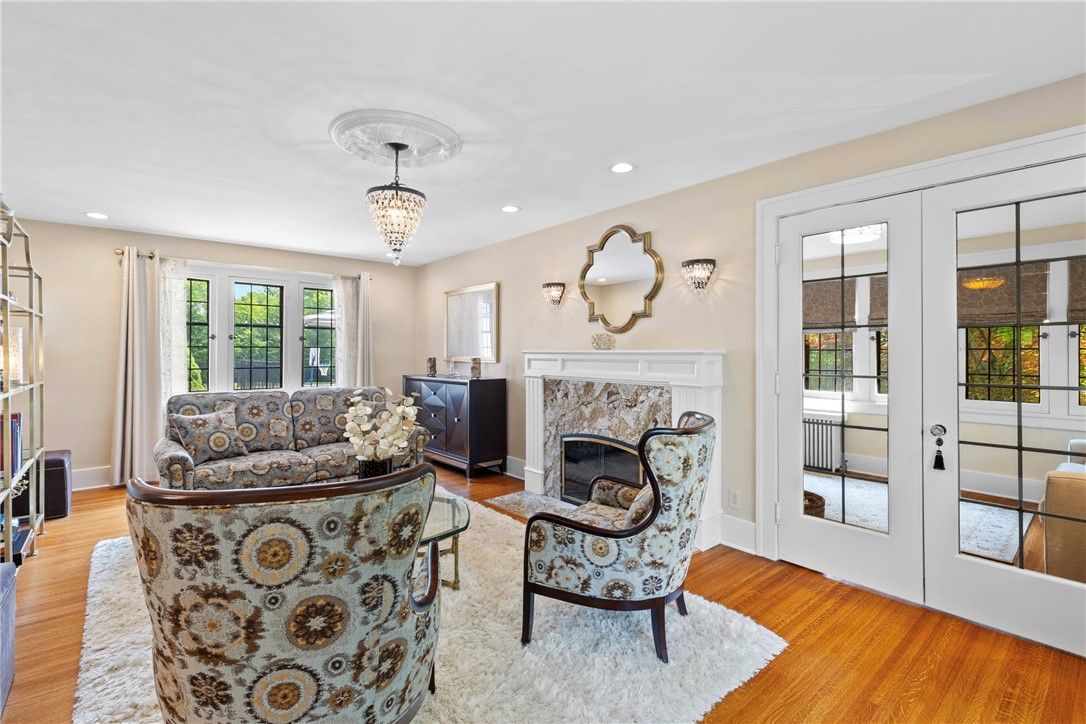Chandelier, Fireplace, Interior, Living room, Recessed Lighting, Wood Texture Flooring