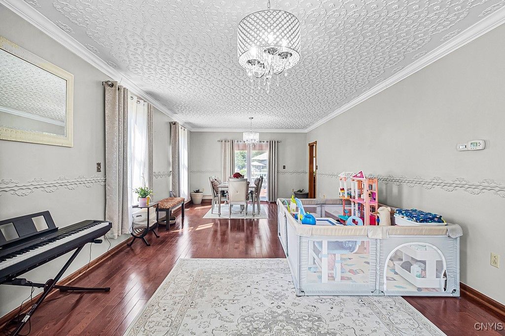 Chandelier, Dining room, Interior, Piano, Wood Texture Flooring