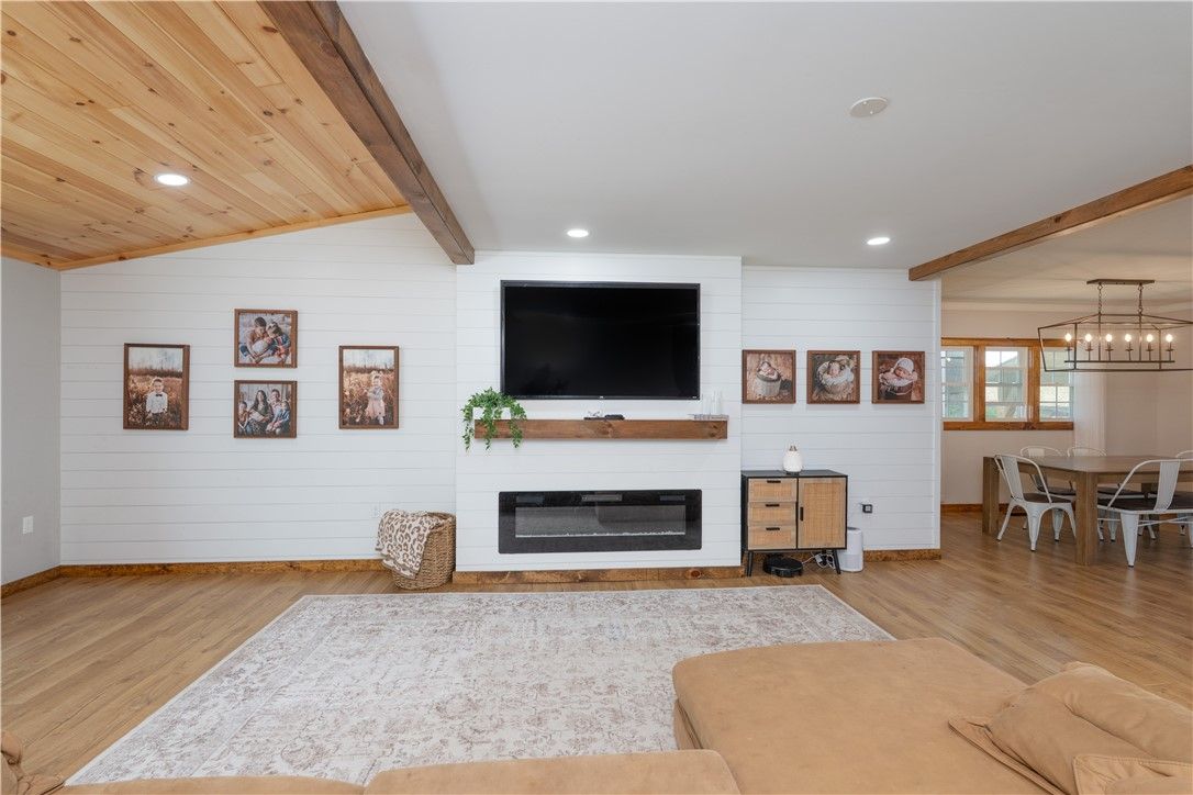 Dining room, Fireplace, Interior, Living room, Pendant Lights, Recessed Lighting, Wooden Beams, Wooden Ceilings, Wood Texture Flooring
