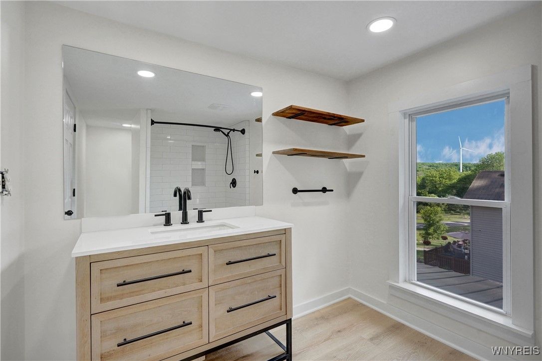 Bathroom, Dual Sink Vanities, Interior, Recessed Lighting, Wood Texture Flooring