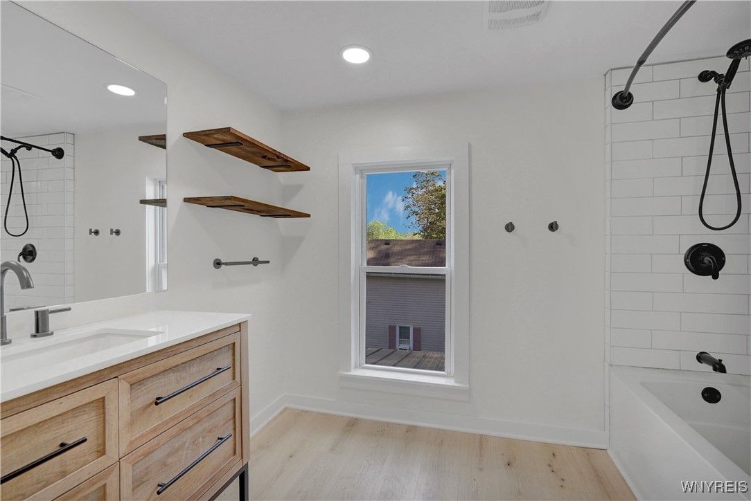 Bathroom, Dual Sink Vanities, Interior, Recessed Lighting, Wood Texture Flooring