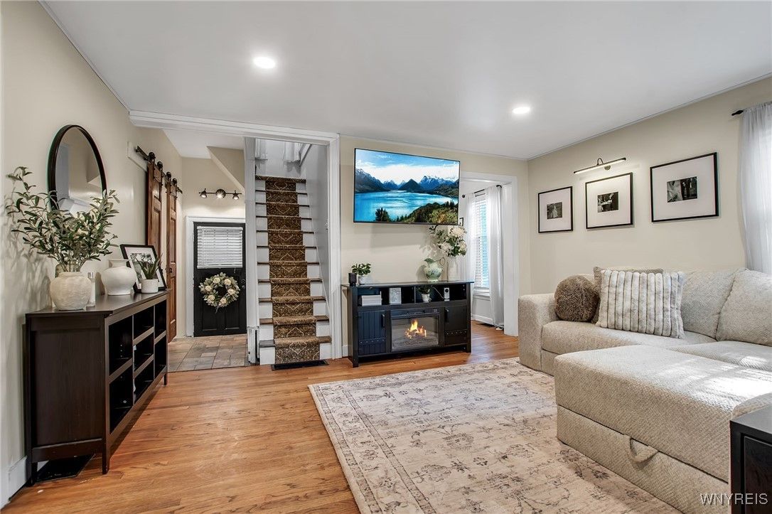 Fireplace, Interior, Living room, Recessed Lighting, Wood Texture Flooring