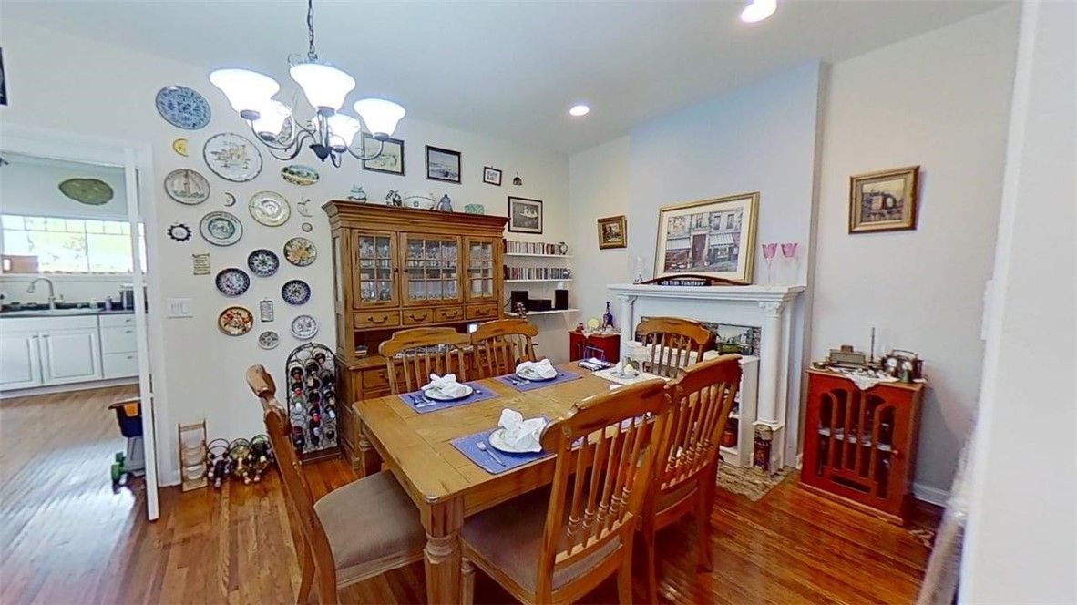 Chandelier, Dining room, Fireplace, Interior, Recessed Lighting, Wood Texture Flooring