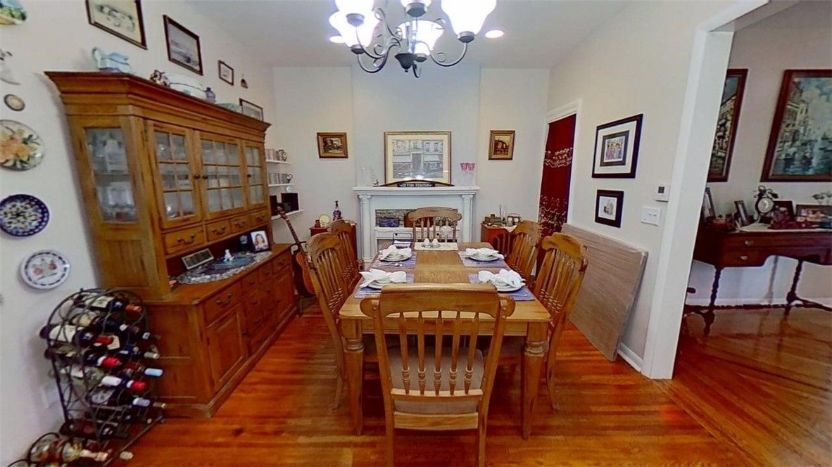 Chandelier, Dining room, Fireplace, Interior, Recessed Lighting, Wood Texture Flooring