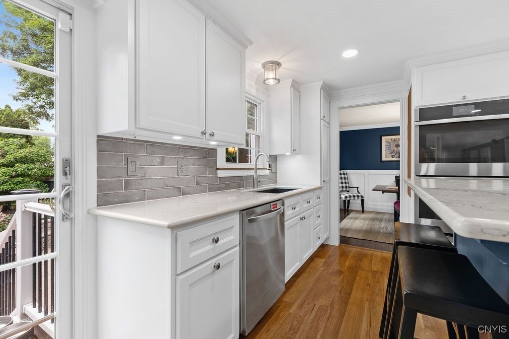 Interior, Kitchen, Recessed Lighting, Stainless Steel Appliances, Wood Texture Flooring
