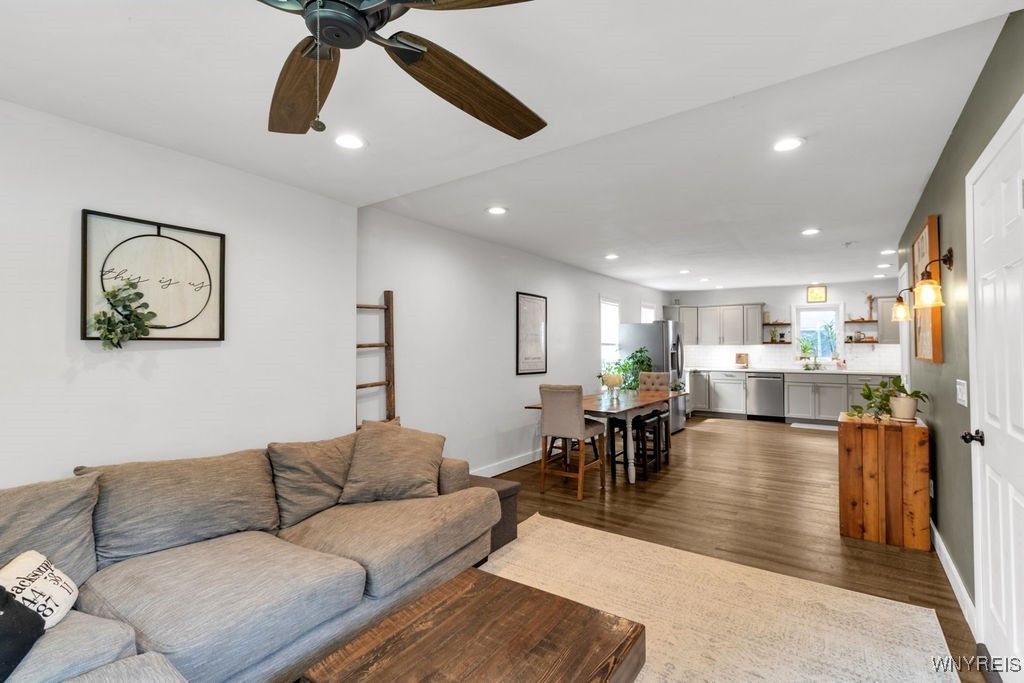 Dining room, Interior, Kitchen, Living room, Pendant Lights, Recessed Lighting, Stainless Steel Appliances, Wood Texture Flooring