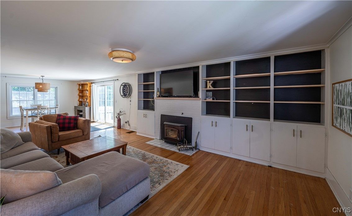 Dining room, Fireplace, Interior, Living room, Pendant Lights, Wood Texture Flooring