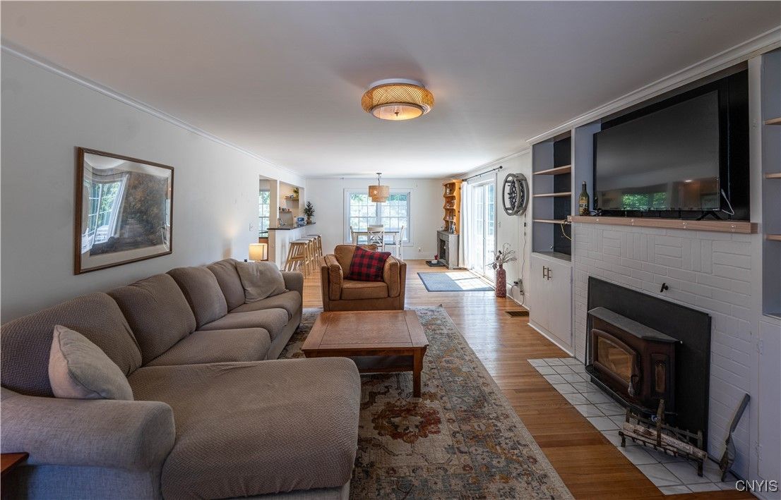 Dining room, Fireplace, Interior, Living room, Wood Texture Flooring