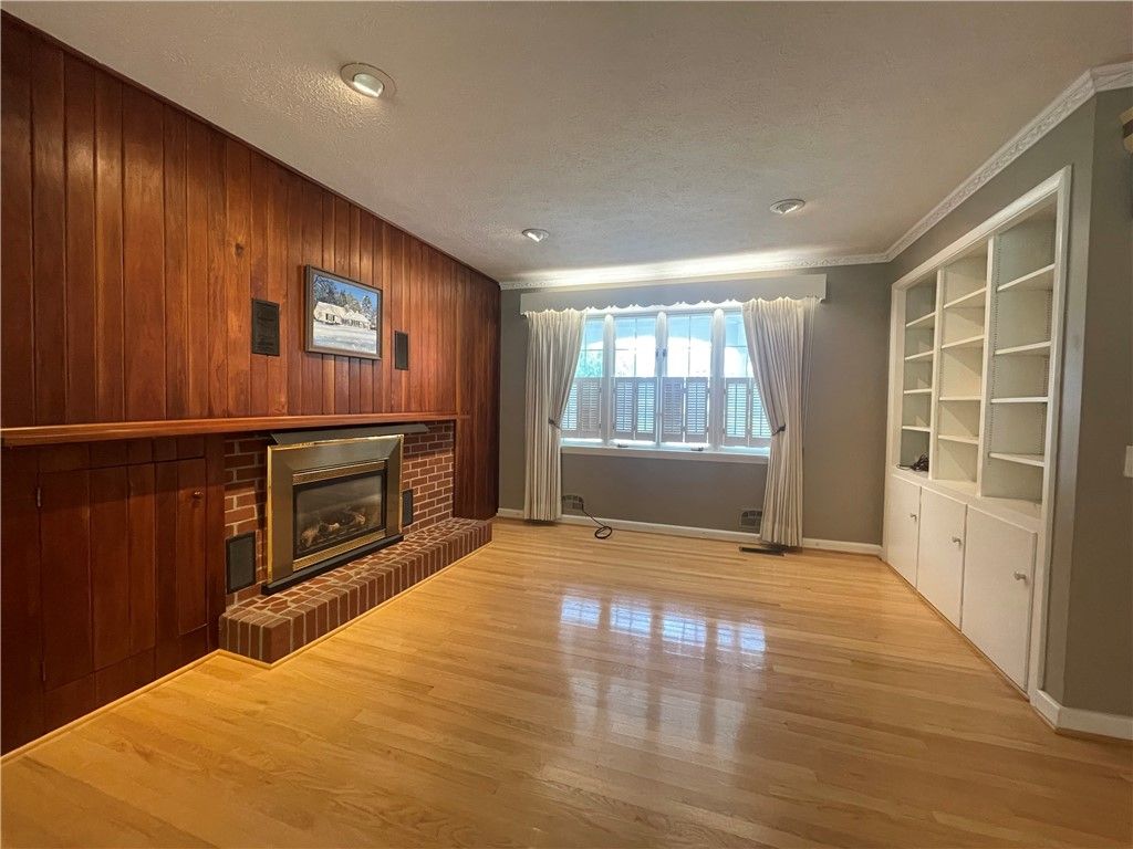 Empty room, Fireplace, Interior, Recessed Lighting, Wood Texture Flooring, Wooden Walls