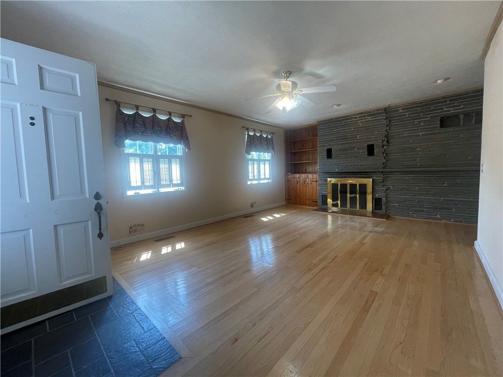 Empty room, Fireplace, Interior, Stone Walls, Wood Texture Flooring