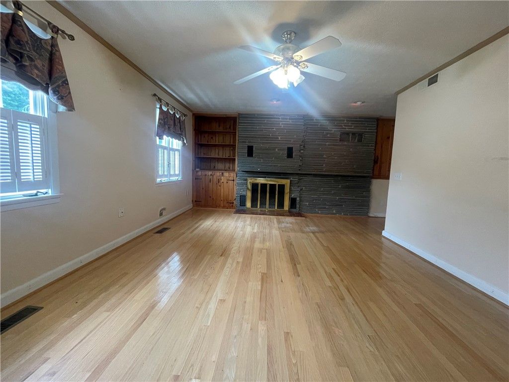 Empty room, Fireplace, Interior, Stone Walls, Wood Texture Flooring