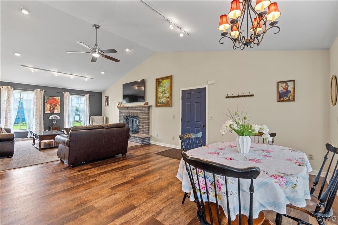 Chandelier, Dining room, Fireplace, Interior, Living room, Recessed Lighting, Wood Texture Flooring