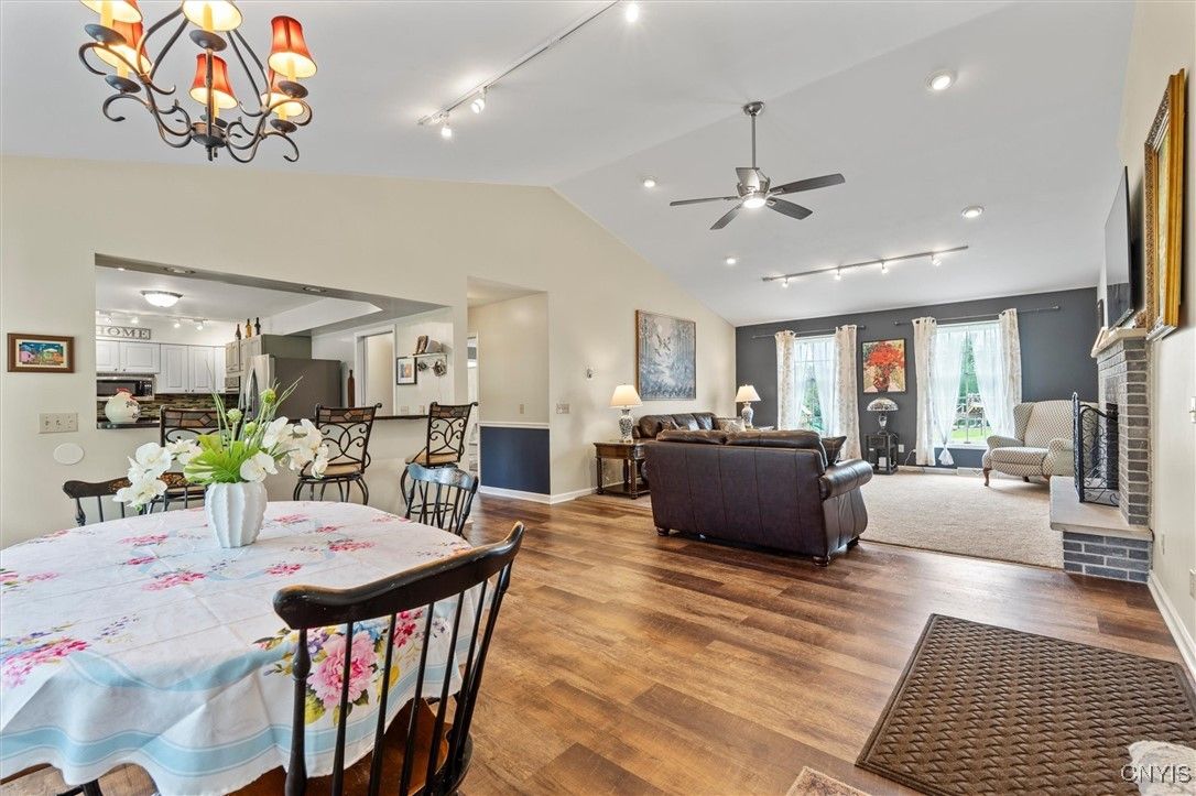 Chandelier, Dining room, Fireplace, Interior, Living room, Recessed Lighting, Wood Texture Flooring
