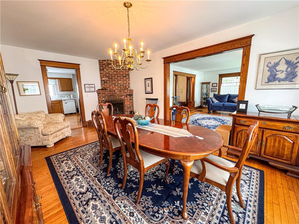 Chandelier, Dining room, Fireplace, Interior, Living room, Wood Texture Flooring