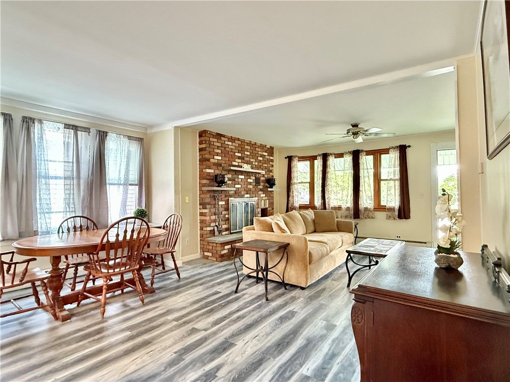 Dining room, Fireplace, Interior, Living room, Stone Walls, Wood Texture Flooring