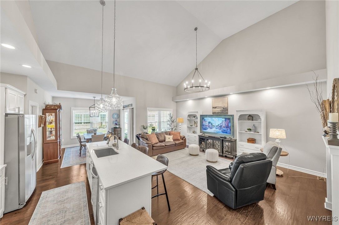 Chandelier, Dining room, Fireplace, Interior, Kitchen, Living room, Pendant Lights, Recessed Lighting, Wood Texture Flooring