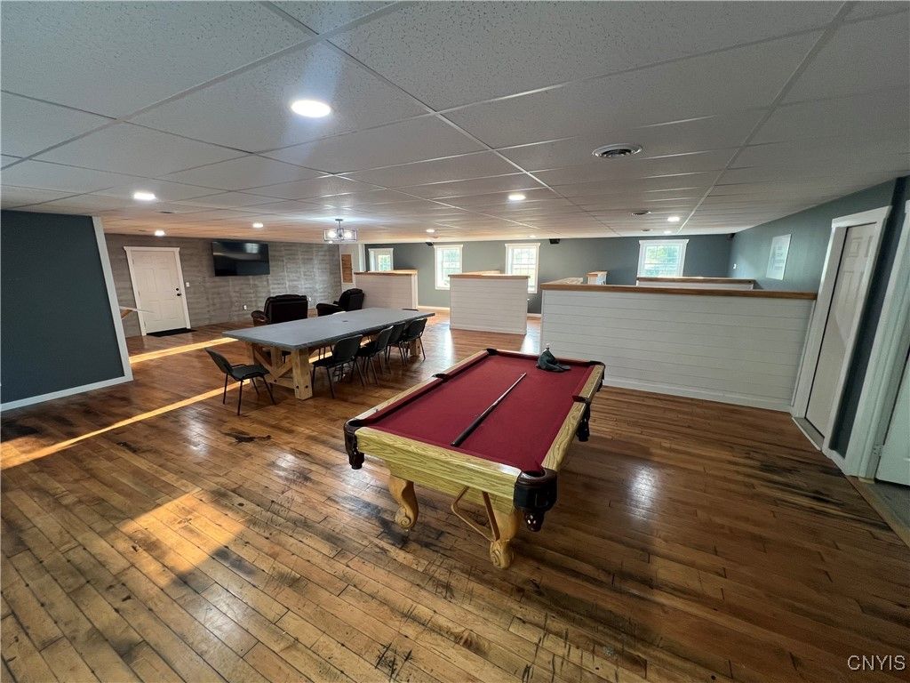 Billiard Table, Dining room, Game Room, Interior, Pendant Lights, Recessed Lighting, Stone Walls, Wood Texture Flooring