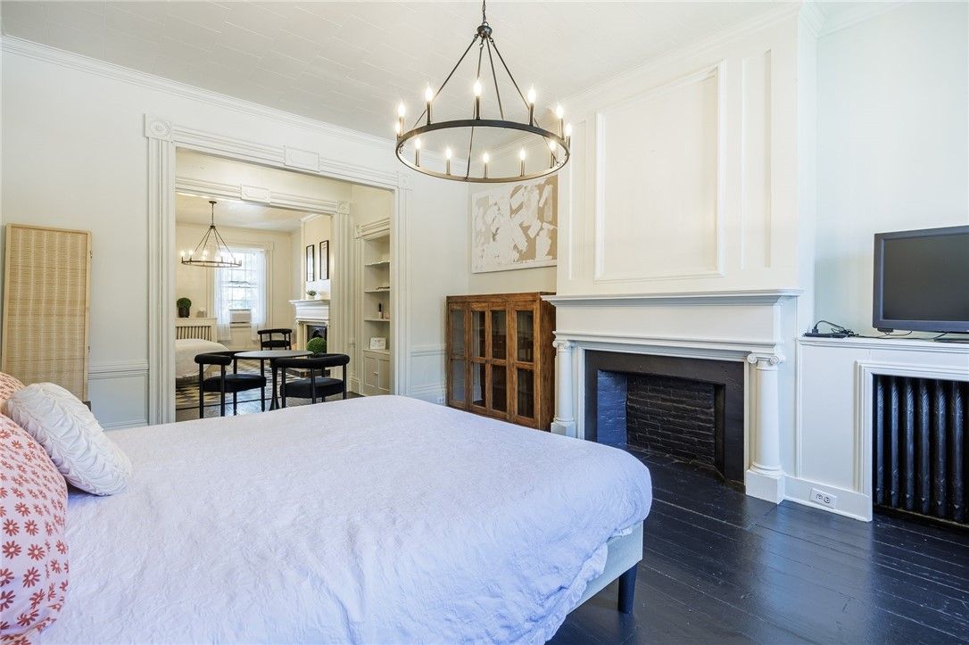 Bedroom, Chandelier, Fireplace, Interior, Pendant Lights, Wood Texture Flooring