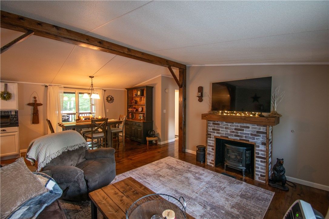 Dining room, Fireplace, Interior, Pendant Lights, Wooden Beams, Wood Texture Flooring