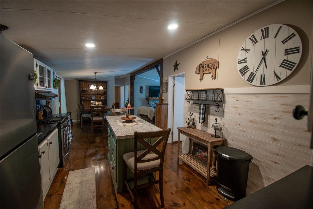 Chandelier, Dining room, Interior, Kitchen, Recessed Lighting, Wood Texture Flooring, Wooden Walls