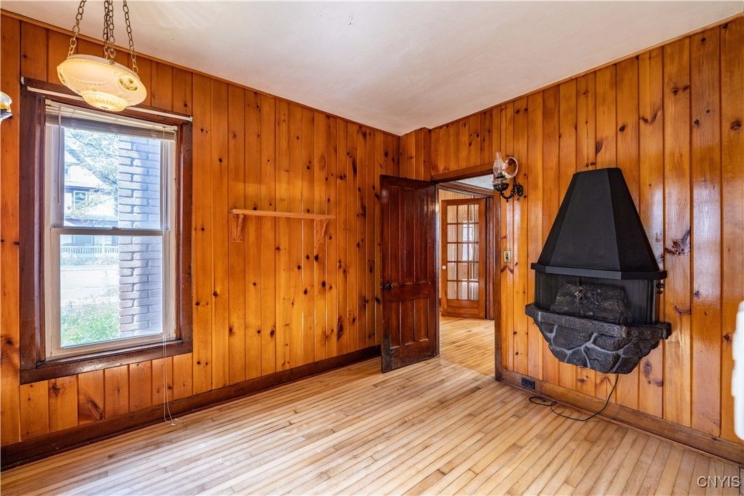 Empty room, Fireplace, Interior, Pendant Lights, Wood Texture Flooring, Wooden Walls