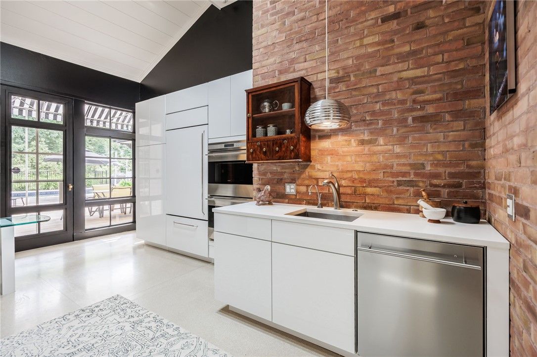 Interior, Kitchen, Pendant Lights, Stainless Steel Appliances, Stone Walls