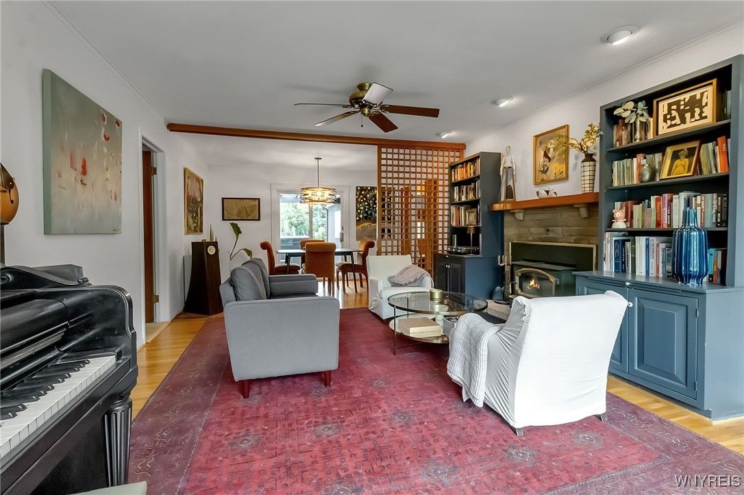 Dining room, Fireplace, Interior, Living room, Pendant Lights, Recessed Lighting, Wood Texture Flooring