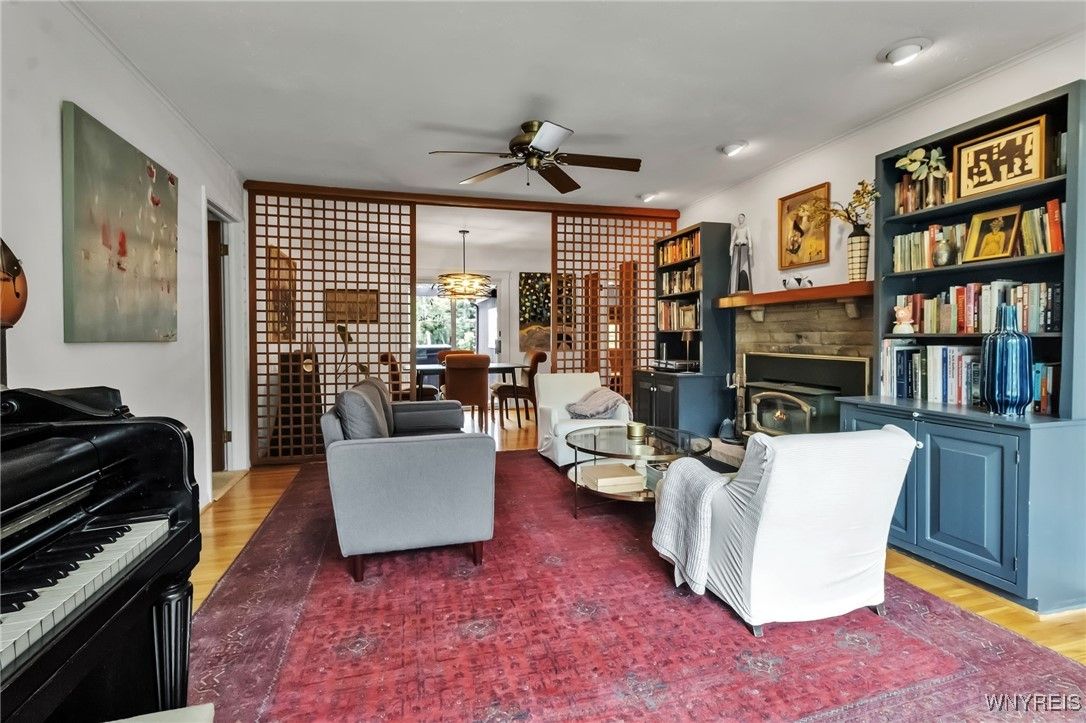 Dining room, Fireplace, Interior, Living room, Pendant Lights, Piano, Recessed Lighting, Wood Texture Flooring