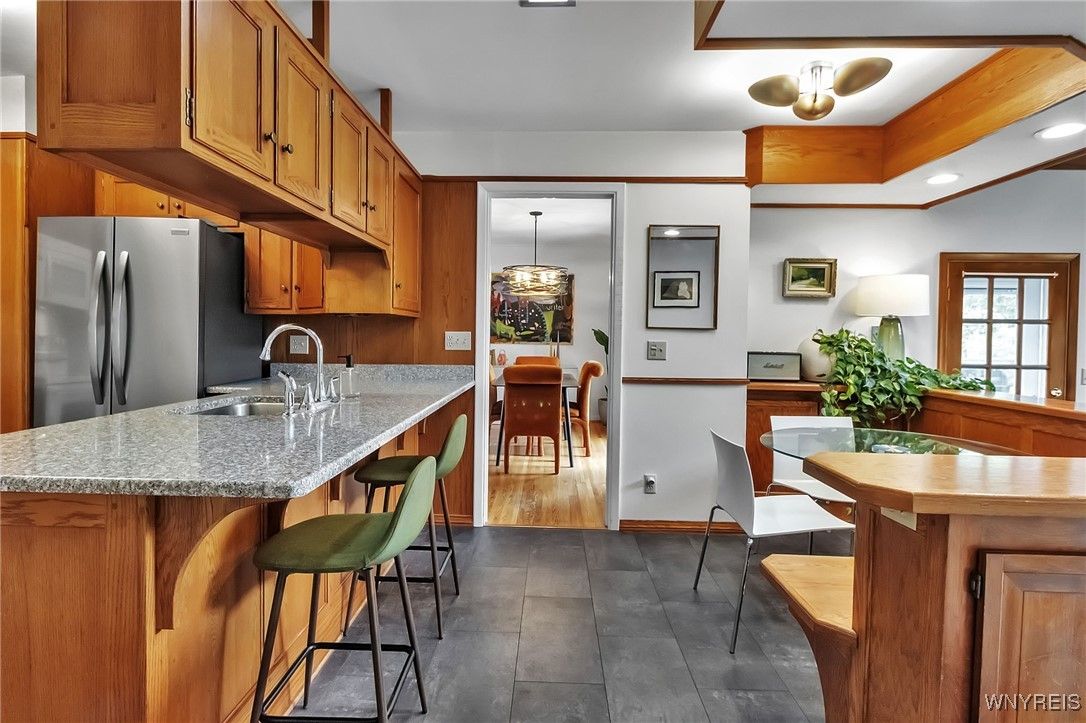 Dining room, Interior, Kitchen, Pendant Lights, Recessed Lighting, Stainless Steel Appliances, Wood Texture Flooring