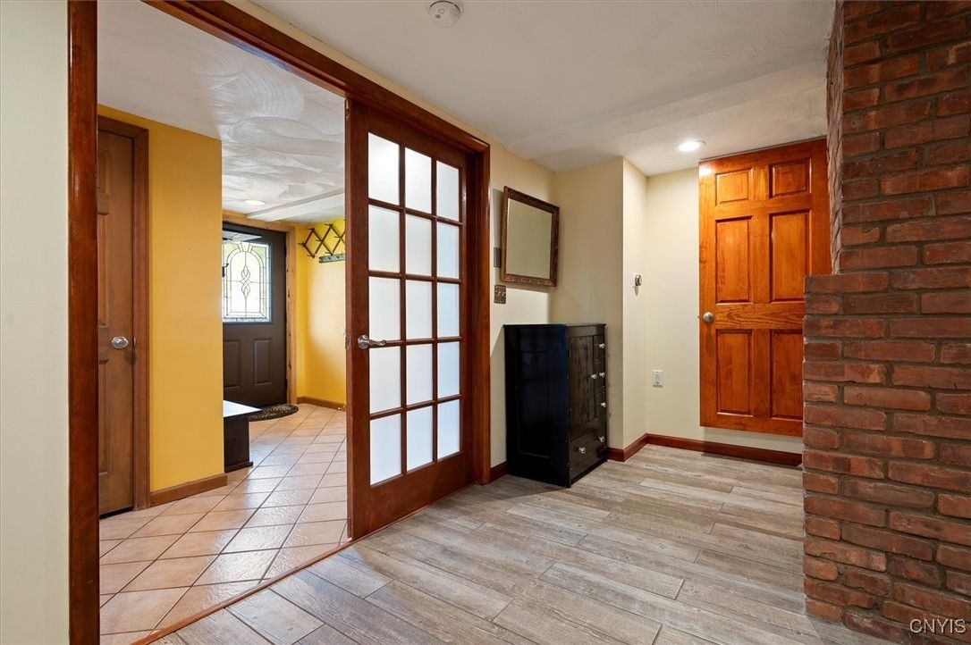 Fireplace, Interior, Recessed Lighting, Stone Walls, Wood Texture Flooring