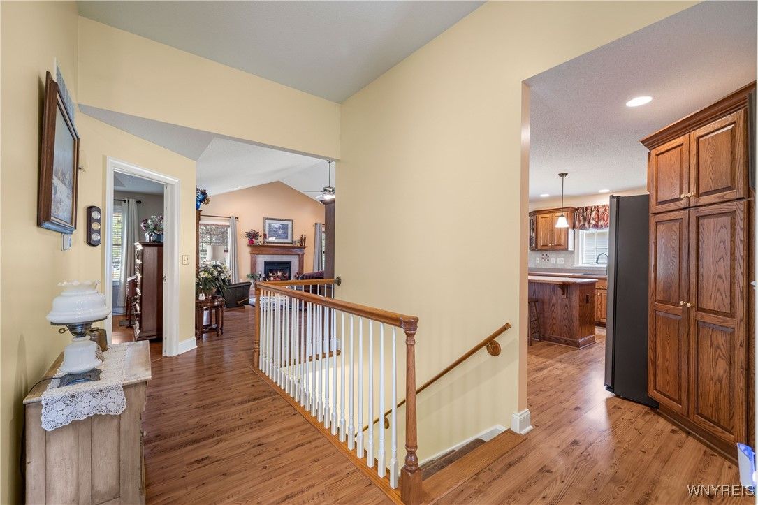 Fireplace, Interior, Pendant Lights, Recessed Lighting, Wood Texture Flooring