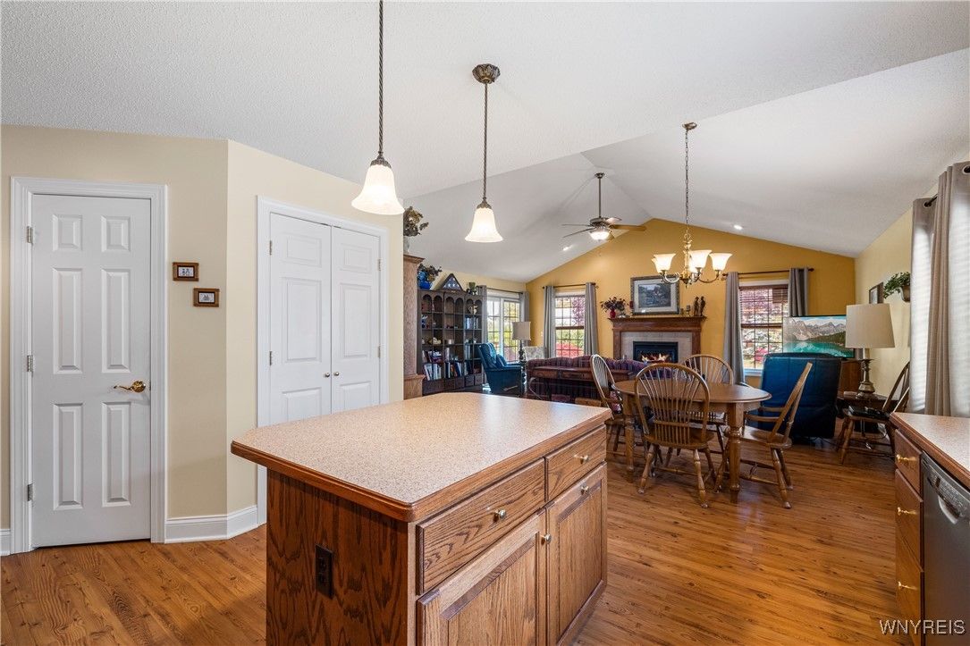 Chandelier, Dining room, Fireplace, Interior, Pendant Lights, Recessed Lighting, Wood Texture Flooring