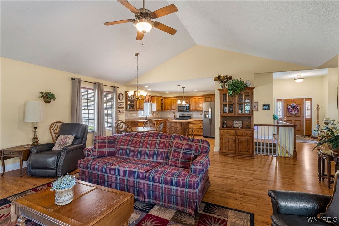 Chandelier, Interior, Kitchen, Living room, Pendant Lights, Recessed Lighting, Stainless Steel Appliances, Wood Texture Flooring