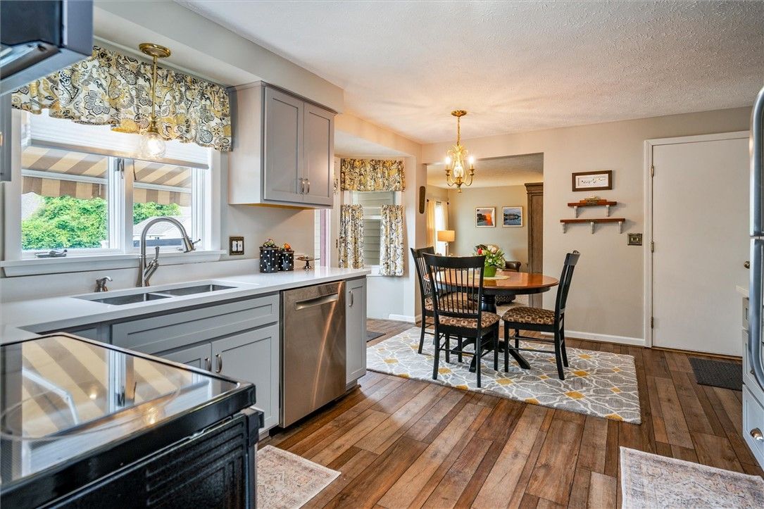 Chandelier, Dining room, Interior, Kitchen, Stainless Steel Appliances, Wood Texture Flooring
