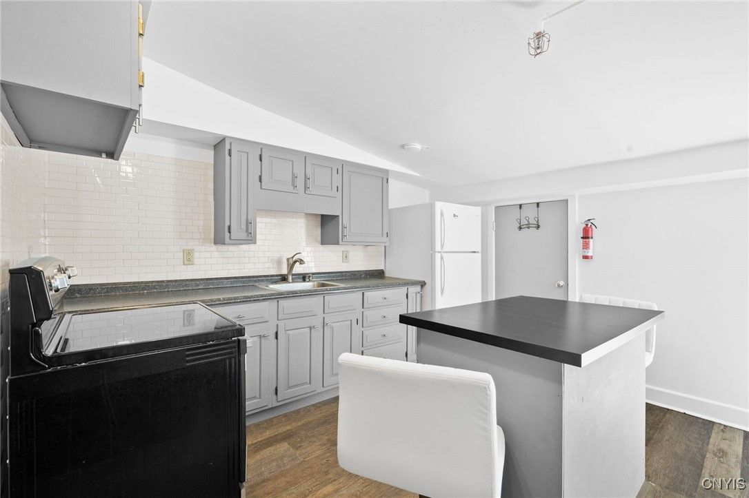 Interior, Kitchen, Tile Countertops, Wood Texture Flooring