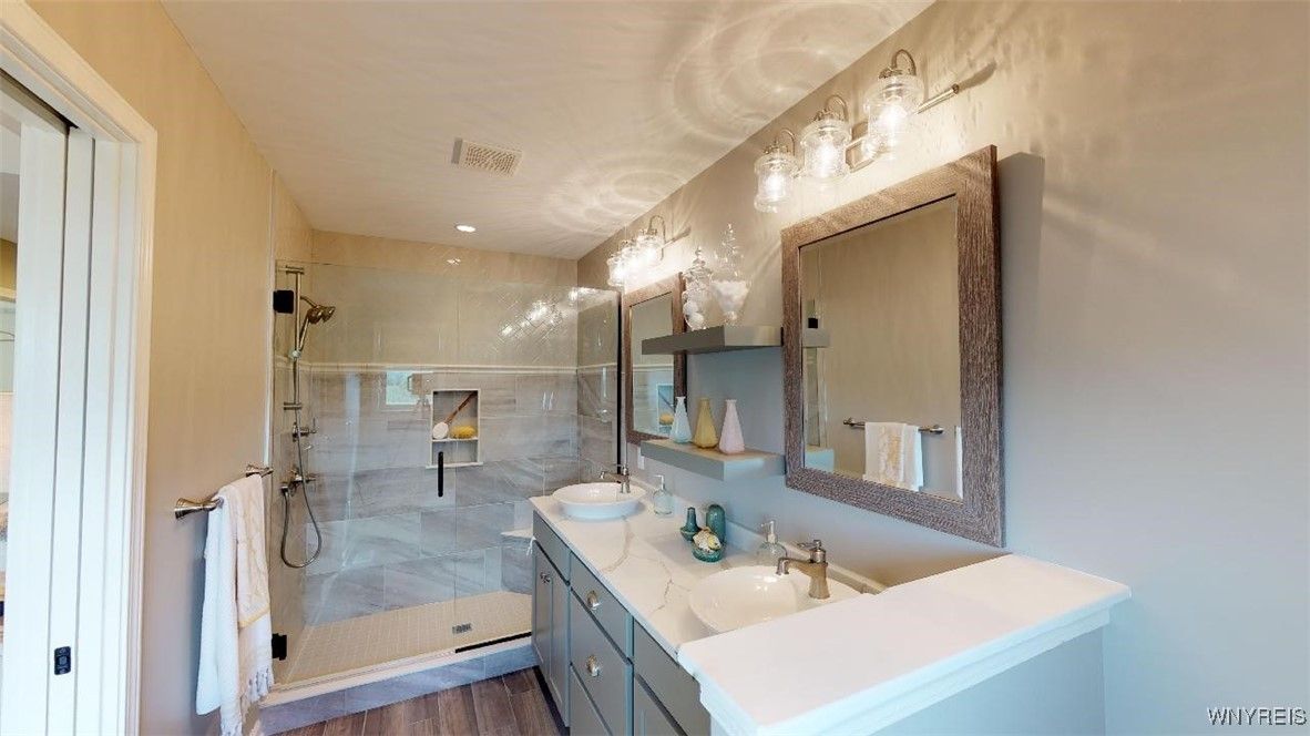 Bathroom, Dual Sink Vanities, Glass Shower, Interior, Recessed Lighting, Wood Texture Flooring